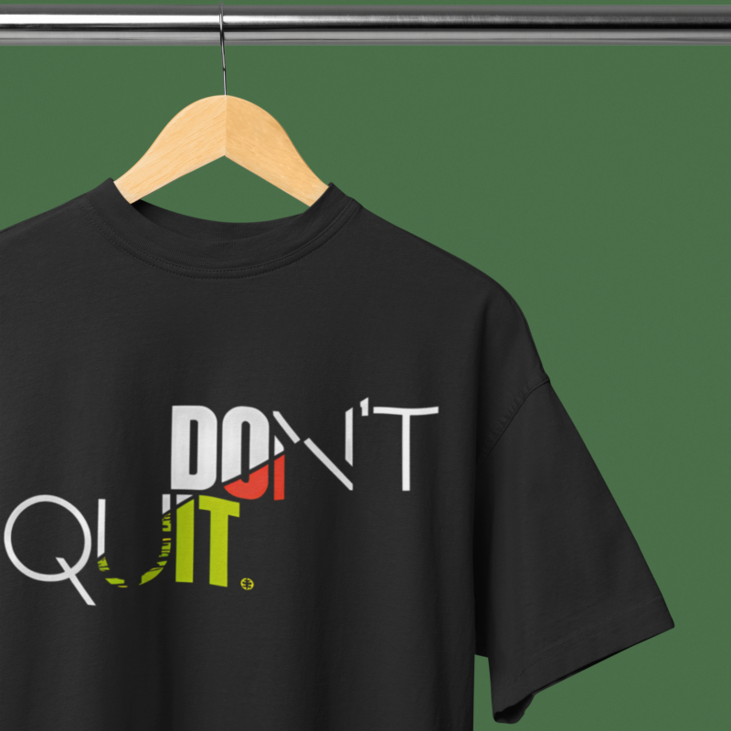 oversized-round-neck-t-shirt-mockup-featuring-a-wooden-hanger-m38915